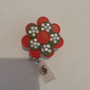 Retractable name badge holder
